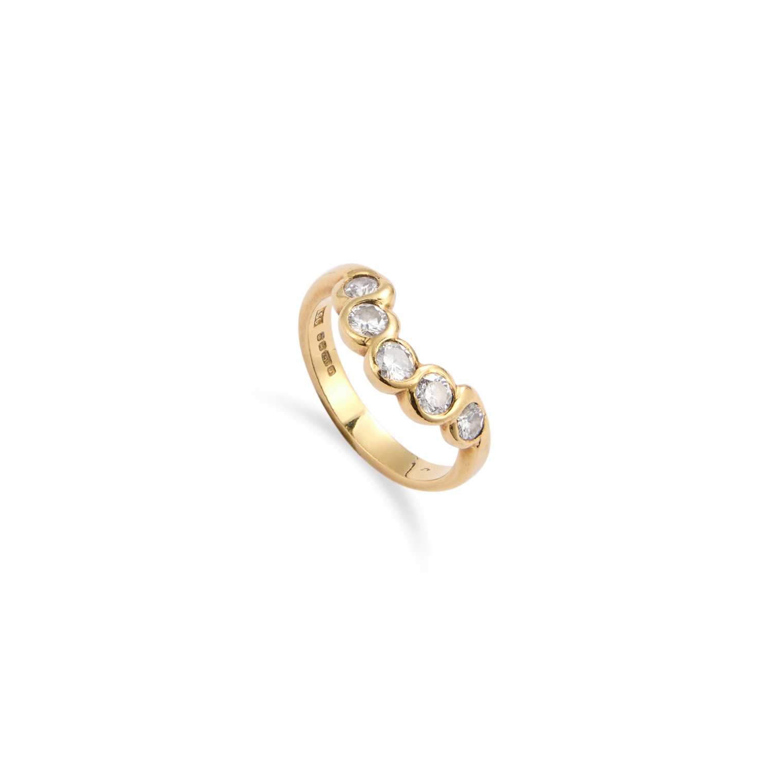 Lot 603 - AN 18 CARAT GOLD FIVE STONE ROUND BRILLIANT-CUT DIAMOND HALF HOOP RING