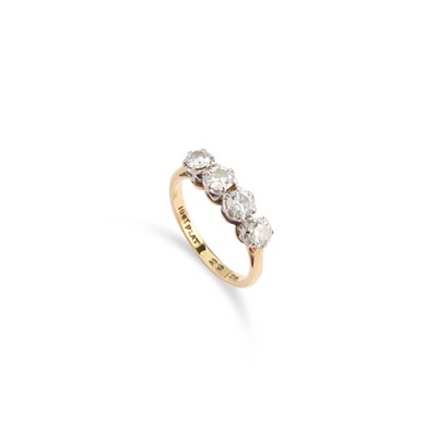 Lot 447 - A FOUR STONE ROUND BRILLIANT-CUT DIAMOND HALF HOOP RING