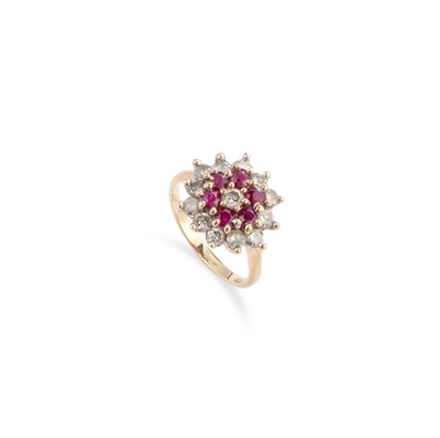 Lot 461 - A 9 CARAT GOLD RUBY AND DIAMOND CLUSTER RING