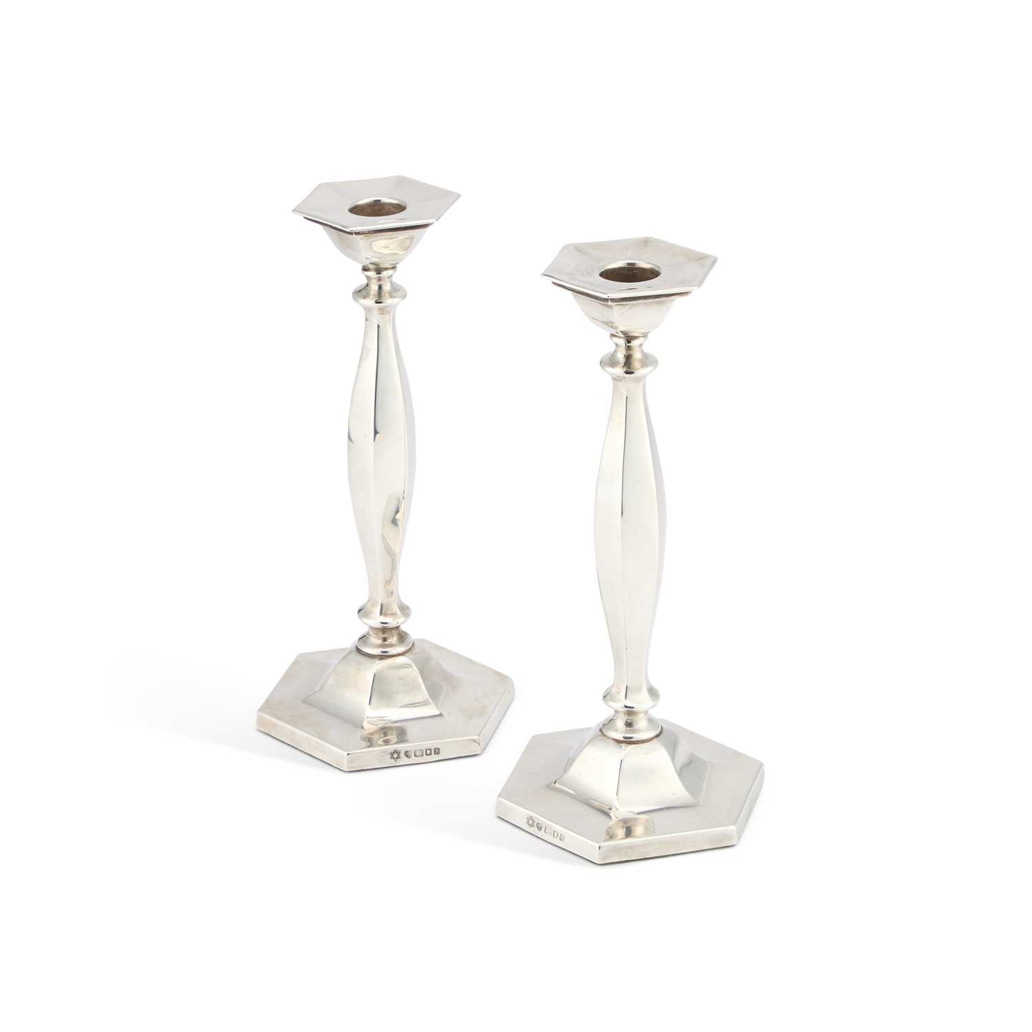 Lot 352 - A PAIR OF ELIZABETH II SILVER CANDLESTICKS