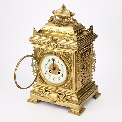 Lot 899 - A 19TH CENTURY FRENCH BRASS CLOCK GARNITURE