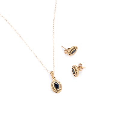 Lot 486 - A 9 CARAT GOLD SAPPHIRE AND DIAMOND PENDANT NECKLACE AND STUD EARRING SET