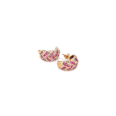 Lot 529 - A PAIR OF RUBY AND WHITE STONE HALF HOOP EARRINGS