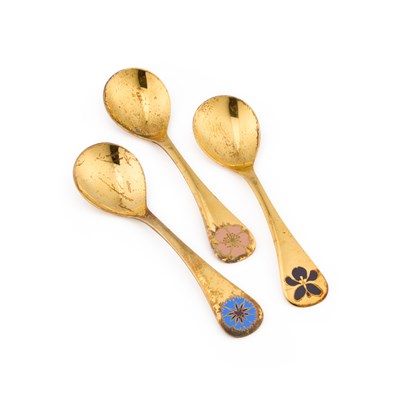 Lot 177 - GEORG JENSEN: THREE DANISH STERLING SILVER-GILT AND ENAMEL SPOONS