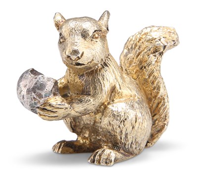 Lot 1170 - AN ELIZABETH II PARCEL-GILT SQUIRREL PAPERWEIGHT