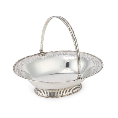 Lot 234 - A GEORGE III STYLE SILVER CAKE BASKET