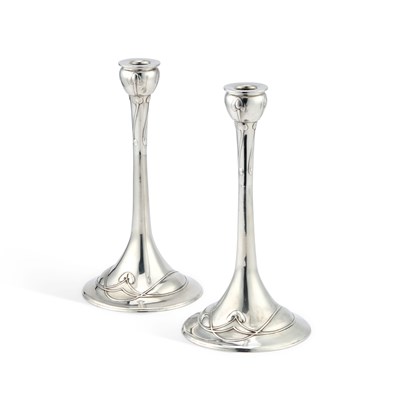 Lot 130 - ARCHIBALD KNOX (1864-1933) FOR LIBERTY & CO, A PAIR OF TUDRIC PEWTER CANDLESTICKS