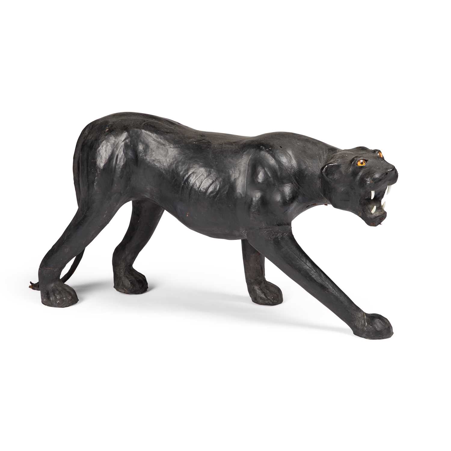 Lot 731 - A LARGE LEATHER-COVERED MODEL OF A PANTHER