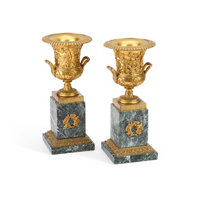 Lot 617 - A PAIR OF 19TH CENTURY FRENCH GILT-BRONZE URNS