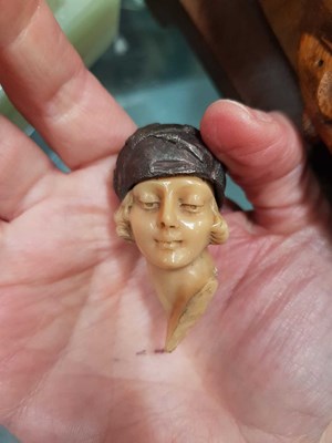 Lot 204 - AN ART DECO BRONZE AND FAUX IVORY FIGURE