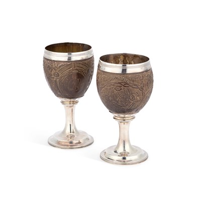 Lot 215 - A PAIR OF GEORGE III SILVER-MOUNTED COCONUT CUPS