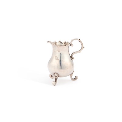 Lot 315 - AN 18TH CENTURY DUTCH SILVER MINIATURE JUG