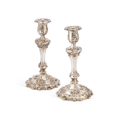 Lot 256 - A PAIR OF 19TH CENTURY SILVER-PLATED CANDLESTICKS