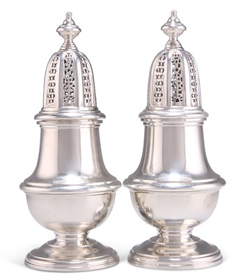 Lot 1219 - A PAIR OF GEORGIAN STYLE CAST SILVER SUGAR CASTERS