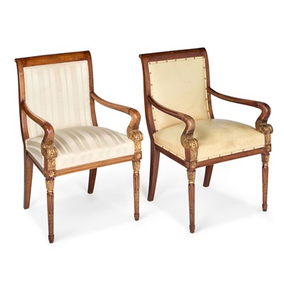 Lot 965 - A PAIR OF EMPIRE STYLE PARCEL-GILT MAHOGANY FAUTEUILS