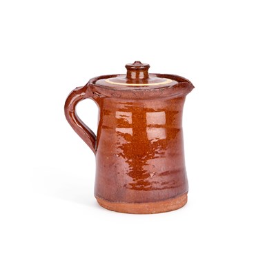 Lot 113 - A 19TH CENTURY SLIPWARE JUG AND COVER