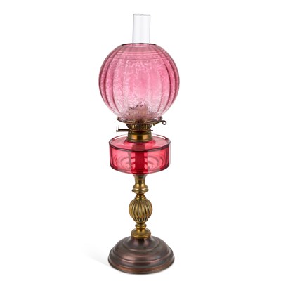 Lot 277 - A VICTORIAN BRASS AND RUBY GLASS OIL LAMP