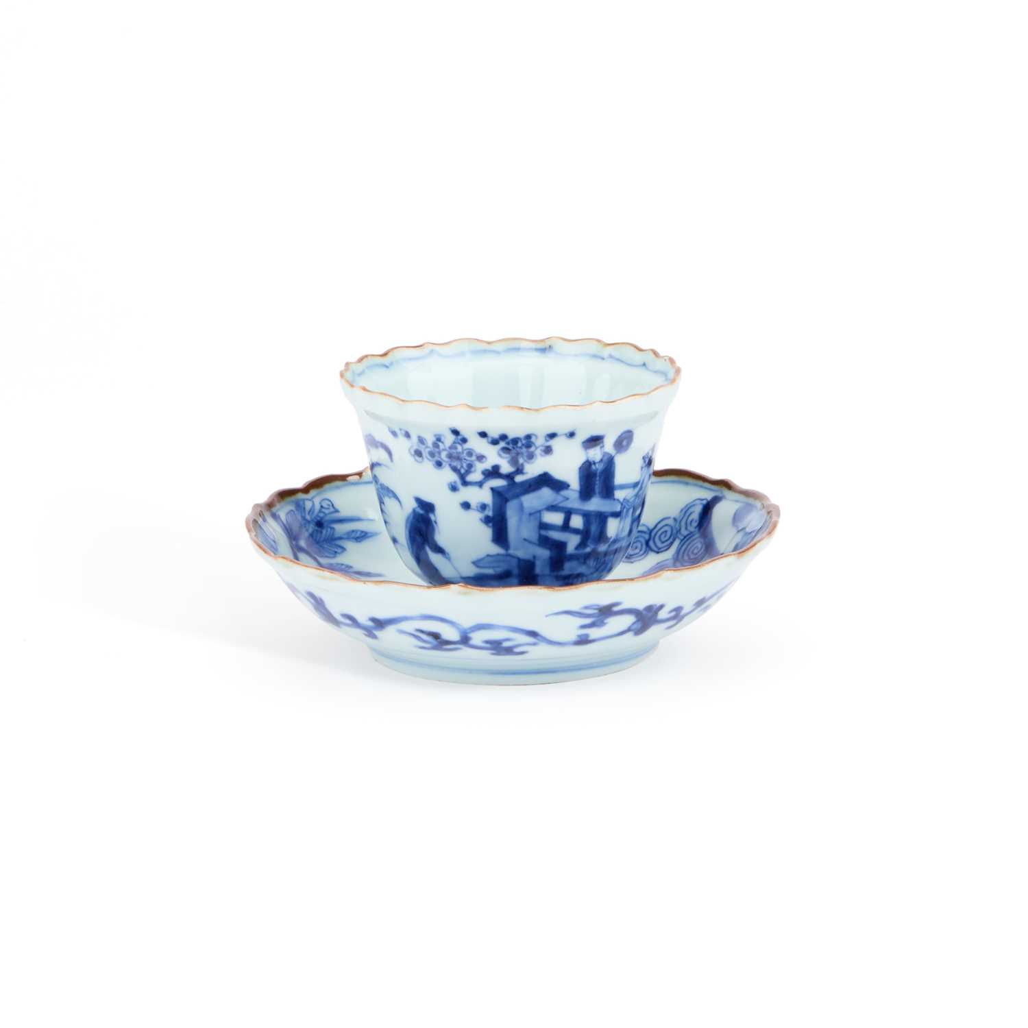 Lot 197 - A JAPANESE BLUE AND WHITE PORCELAIN CUP AND SAUCER
