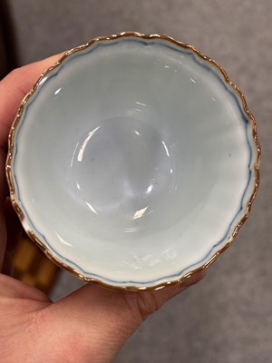 Lot 197 - A JAPANESE BLUE AND WHITE PORCELAIN CUP AND SAUCER