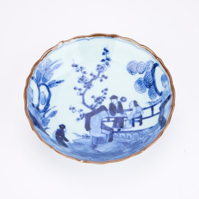 Lot 197 - A JAPANESE BLUE AND WHITE PORCELAIN CUP AND SAUCER