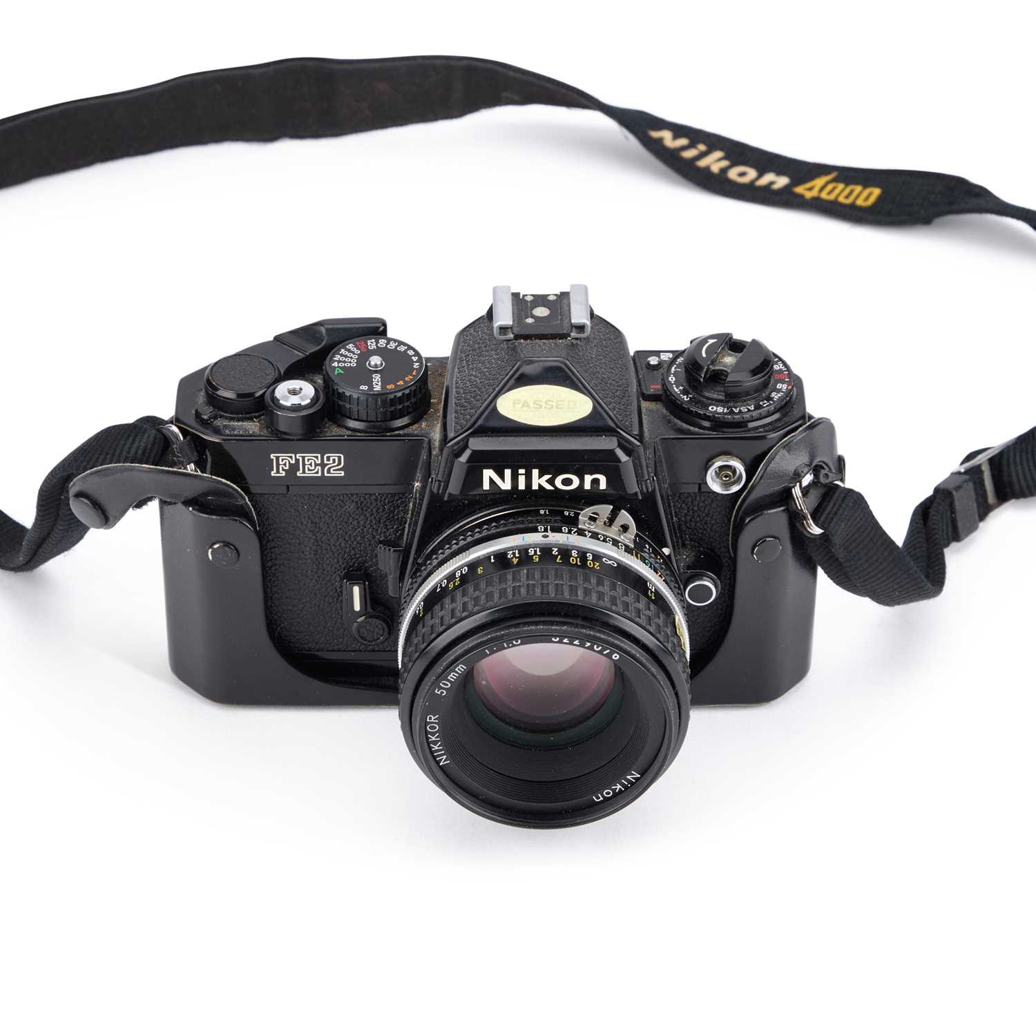 Lot 744 - A NIKON FE2 SLR CAMERA