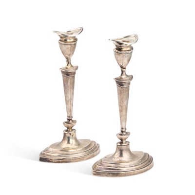 Lot 340 - A PAIR OF ELIZABETH II SILVER CANDLESTICKS