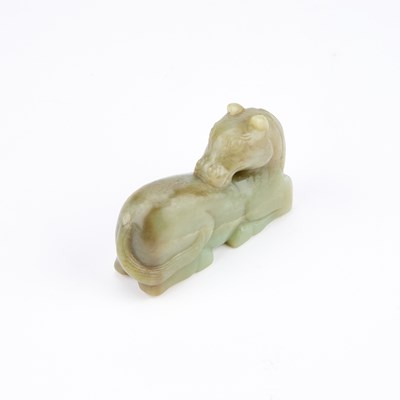 Lot 182 - A 19TH CENTURY CHINESE JADE CARVING OF A RECUMBENT HORSE