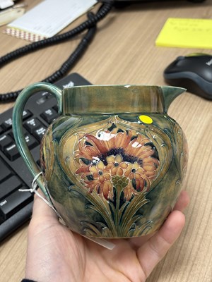 Lot 74 - WILLIAM MOORCROFT FOR JAMES MACINTYRE, A 'REVIVED CORNFLOWER' POTTERY JUG, CIRCA 1912