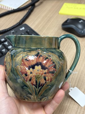 Lot 74 - WILLIAM MOORCROFT FOR JAMES MACINTYRE, A 'REVIVED CORNFLOWER' POTTERY JUG, CIRCA 1912