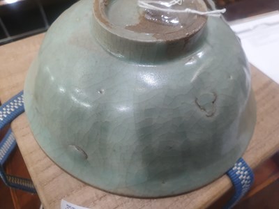 Lot 153 - A CHINESE CELADON BOWL