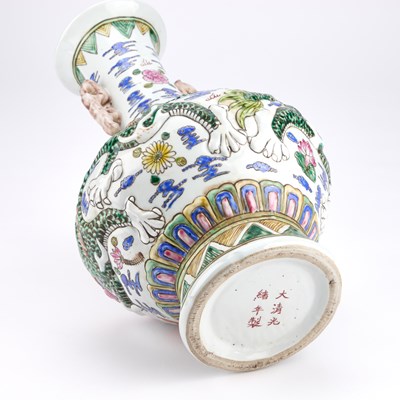 Lot 115 - A LARGE CHINESE FAMILLE ROSE MOULDED PORCELAIN VASE