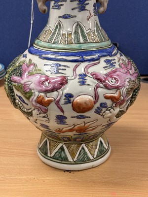 Lot 115 - A LARGE CHINESE FAMILLE ROSE MOULDED PORCELAIN VASE