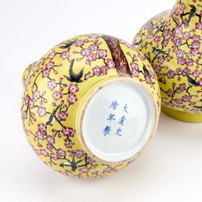 Lot 88 - A PAIR OF CHINESE FAMILLE ROSE PORCELAIN 'MAGPIE AND PRUNUS' BOTTLE VASES