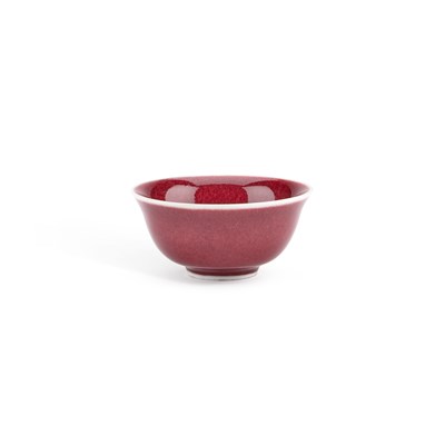 Lot 105 - A SMALL CHINESE OX-BLOOD PORCELAIN BOWL