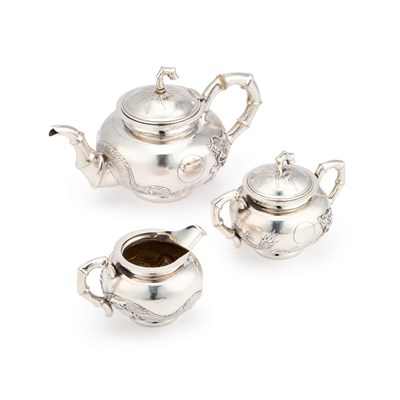 Lot 293 - AN EARLY 20TH CENTURY CHINESE SILVER THREE-PIECE TEA SERVICE