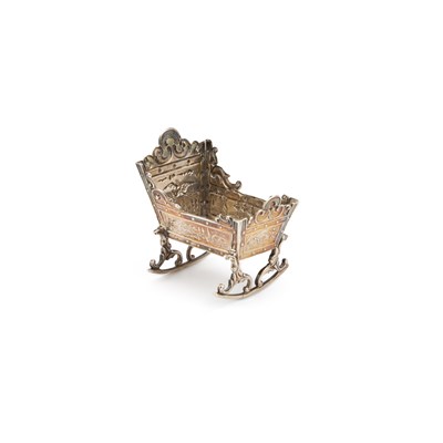 Lot 288 - A CONTINENTAL SILVER MODEL OF A CRADLE