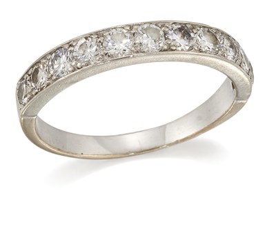 Lot 1395 - A DIAMOND HALF HOOP RING