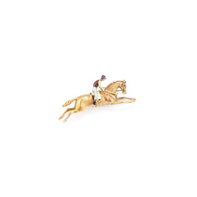 Lot 685 - A HORSE AND JOCKEY BROOCH