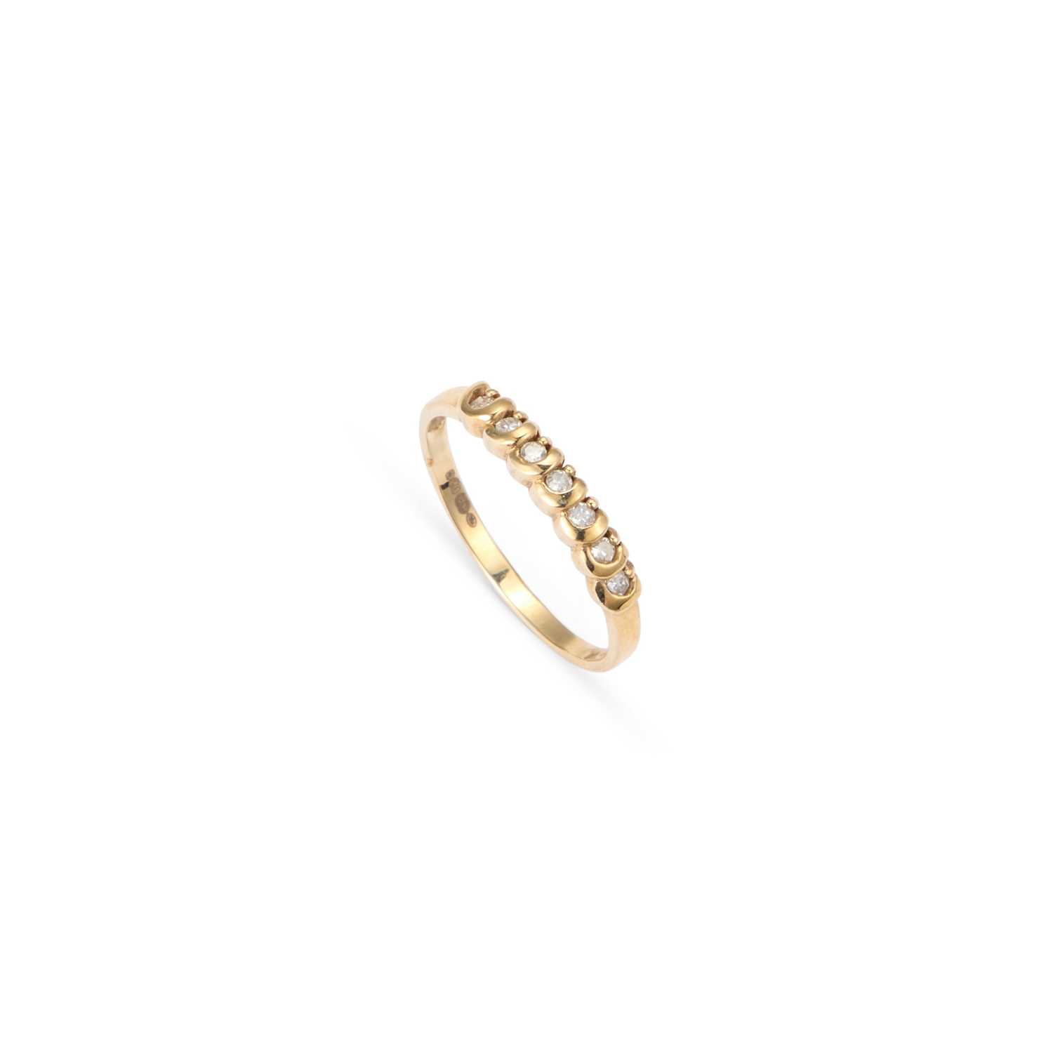 Lot 673 - A 9 CARAT GOLD DIAMOND HALF HOOP RING