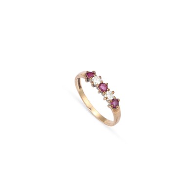 Lot 745 - A 9 CARAT GOLD FIVE STONE RUBY AND DIAMOND RING