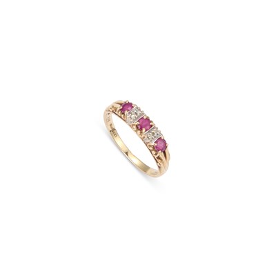 Lot 681 - A 9 CARAT GOLD RUBY AND DIAMOND RING