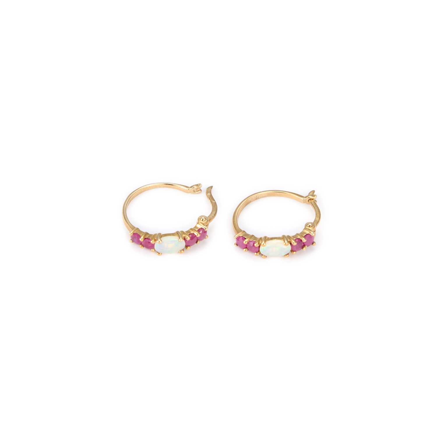 Lot 721 - A PAIR OF OPAL AND RUBY HOOP EARRINGS