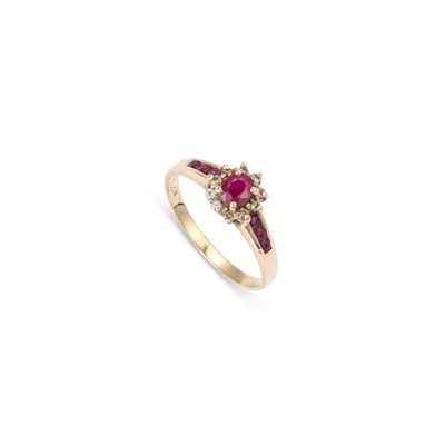 Lot 670 - A 9 CARAT GOLD RUBY AND DIAMOND CLUSTER RING