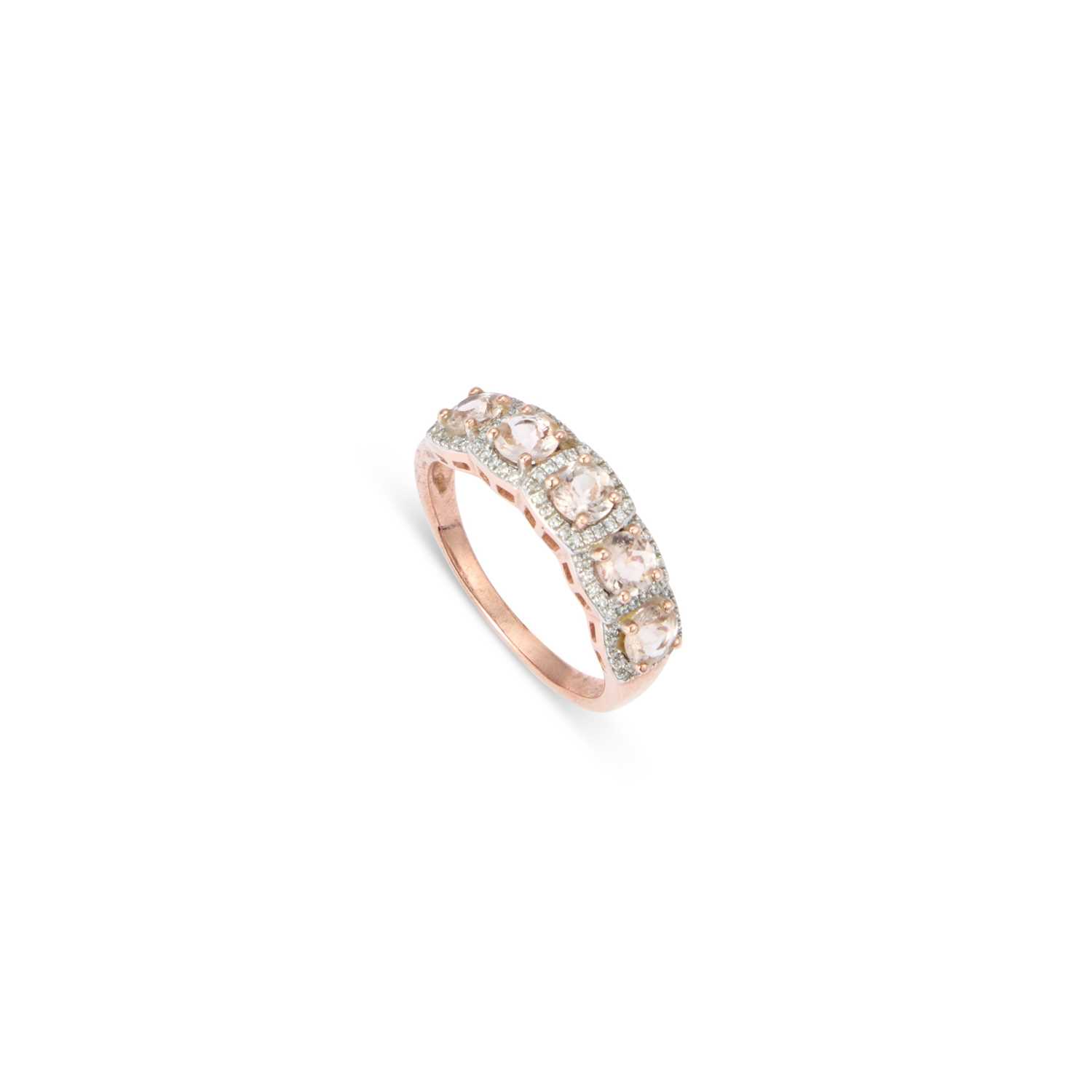 Lot 775 - A 9 CARAT ROSE GOLD MORGANITE AND DIAMOND CLUSTER RING