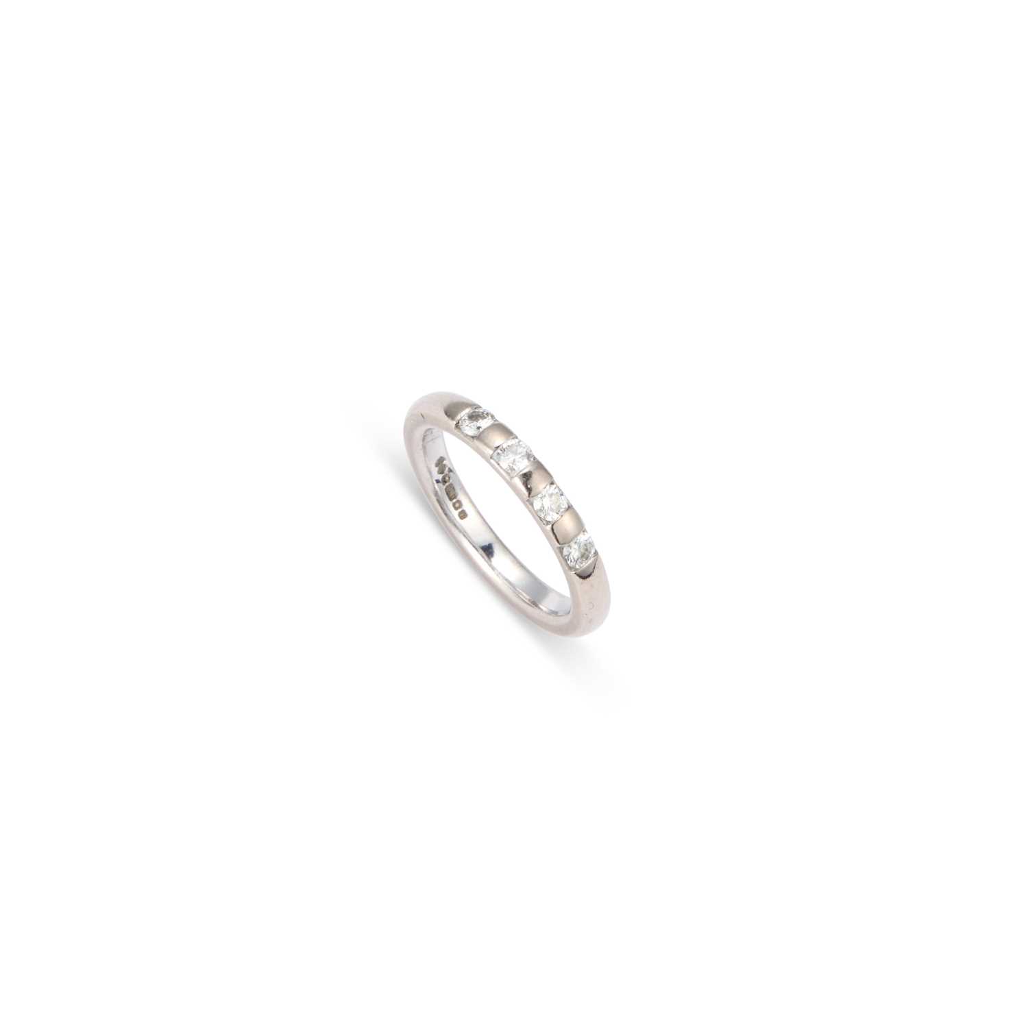 Lot 802 - AN 18 CARAT WHITE GOLD DIAMOND HALF HOOP RING