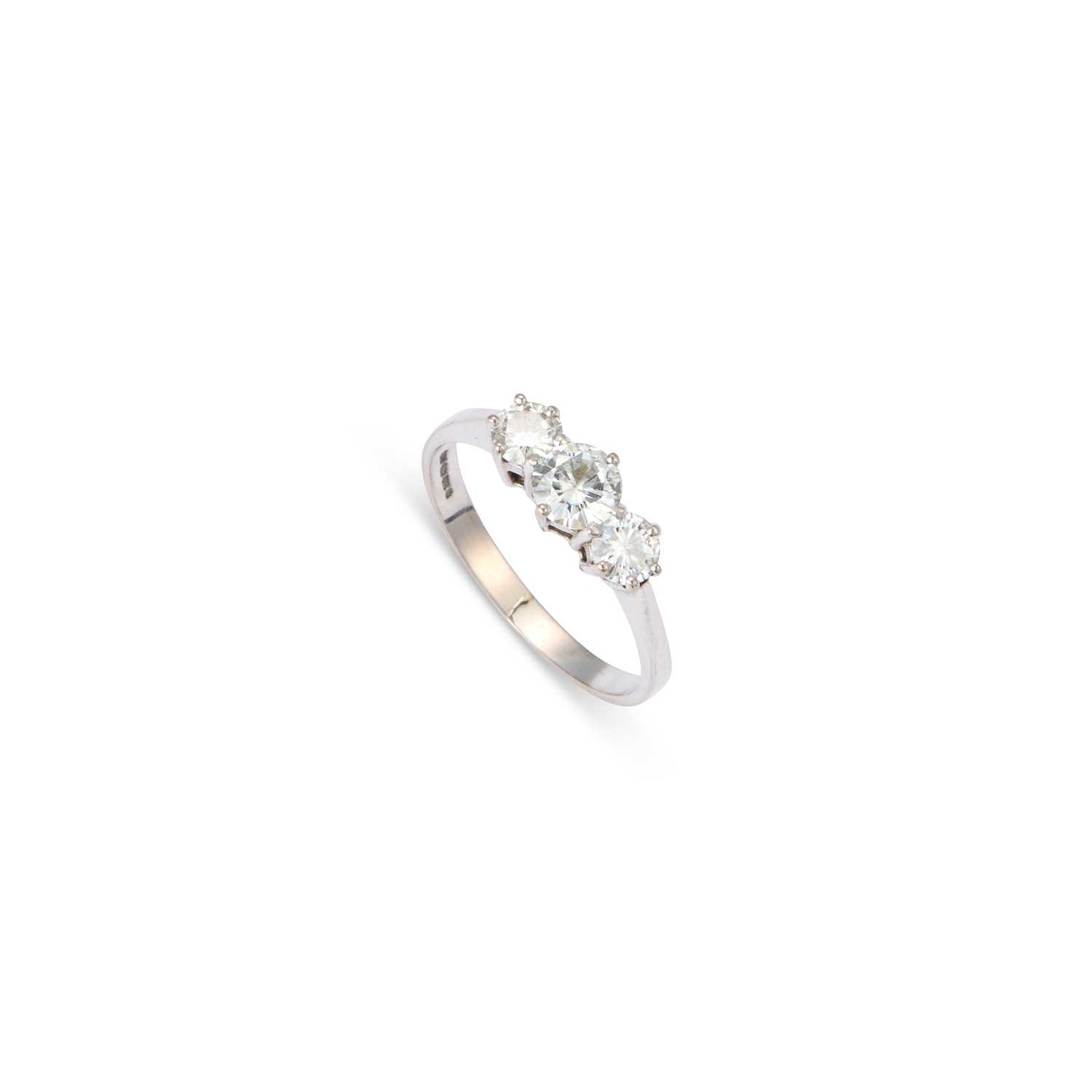 Lot 684 - AN 18 CARAT WHITE GOLD THREE STONE SYNTHETIC MOISSANITE RING