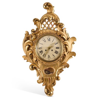 Lot 990 - AN 18TH CENTURY STYLE GILT-WOOD CARTEL CLOCK