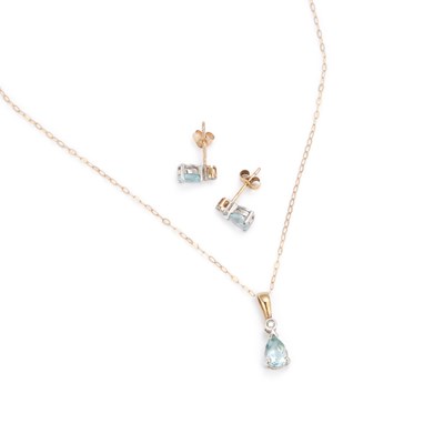 Lot 755 - A 9 CARAT GOLD BLUE TOPAZ AND DIAMOND PENDANT NECKLACE AND STUD EARRINGS SET