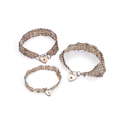 Lot 855 - THREE SILVER GATE LINK BRACELETS