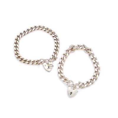 Lot 763 - TWO SILVER CURB LINK BRACELETS WITH HEART PADLOCK CLASPS